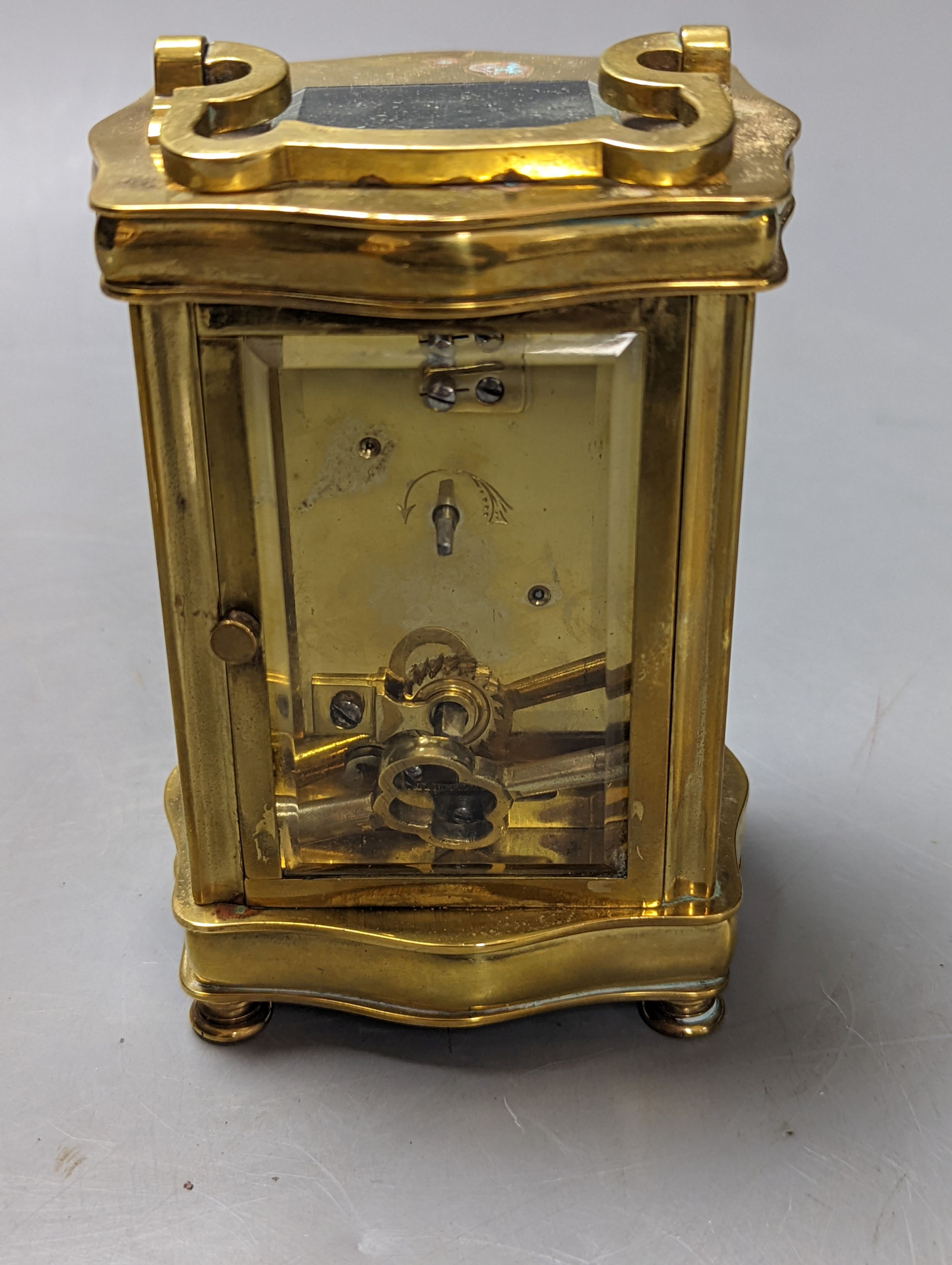 A brass cased carriage timepiece